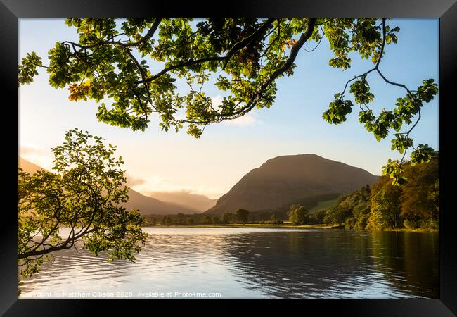 Stunning epic sunrise landscape image looking along Loweswater towards wonderful light on Grasmoor and Mellbreak mountains in Lkae District Framed Print by Matthew Gibson