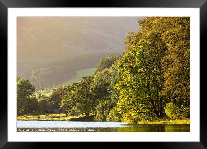 Stunning epic sunrise landscape image looking along Loweswater towards wonderful light on Grasmoor and Mellbreak mountains in Lkae District Framed Mounted Print by Matthew Gibson