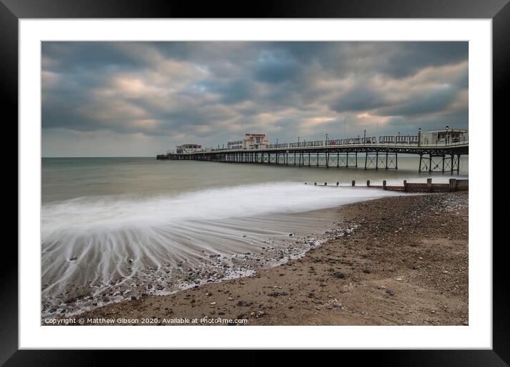Beautiful long exposure sunset landscape image of pier at sea in Worthing England Framed Mounted Print by Matthew Gibson