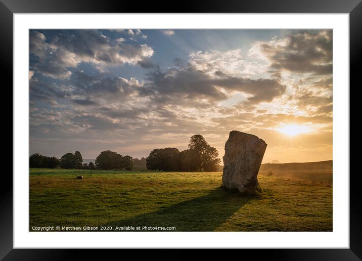 Stunning Summer sunrise landscape of Neolithic standing stones in English cluntryside with gorgeous light with slight background mist Framed Mounted Print by Matthew Gibson