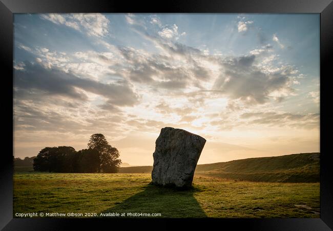 Stunning Summer sunrise landscape of Neolithic standing stones in English cluntryside with gorgeous light with slight background mist Framed Print by Matthew Gibson