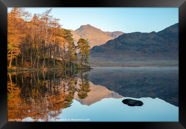 Beautiful Autumn Fall colorful sunrise over Blea Tarn in the Lake District with High Raise and The Langdales in the distance Framed Print by Matthew Gibson