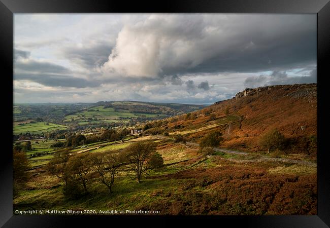 Stunning Autumn Fall landscape image of Crubar Edge in Peak District at sunset with lovely evening light glow Framed Print by Matthew Gibson