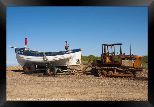 Fishing boat awaiting the tide Framed Print by Hugh McKean