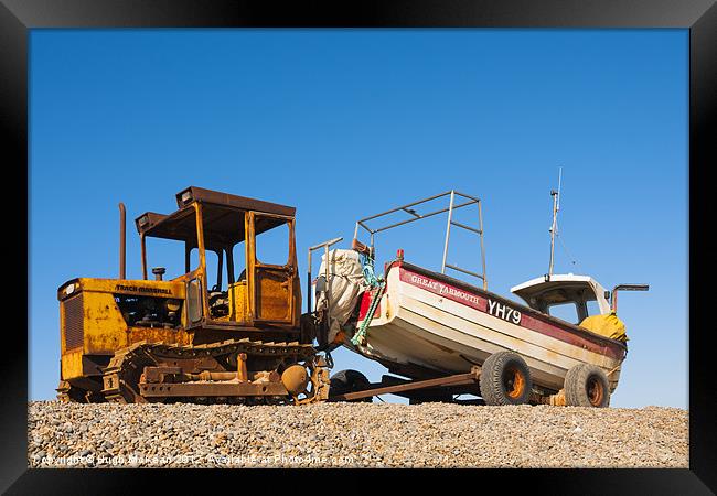 Fishing boat awaiting the tide Framed Print by Hugh McKean