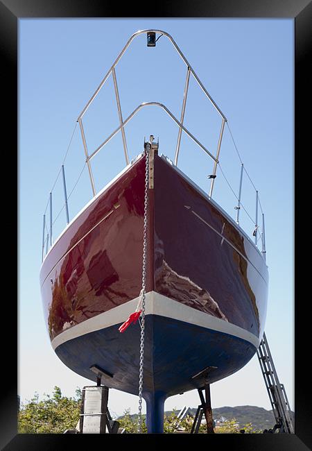 Reflections in a polished yacht hull Framed Print by Hugh McKean