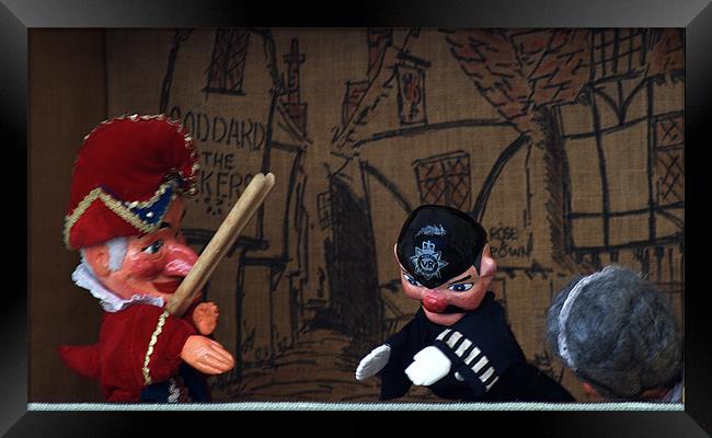 Punch and Judy with the policeman Framed Print by Chris Day