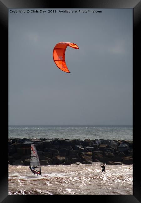 A kite surfer and wind surfer Framed Print by Chris Day