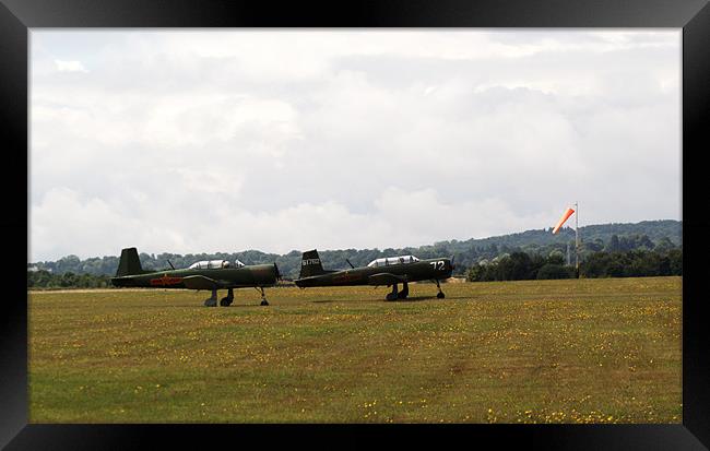 Two Nanchang CJ6 fighter planes near take off Framed Print by Chris Day