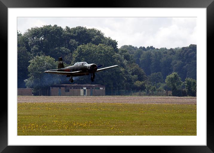 Nanchang CJ6 fighter coming in to land Framed Mounted Print by Chris Day