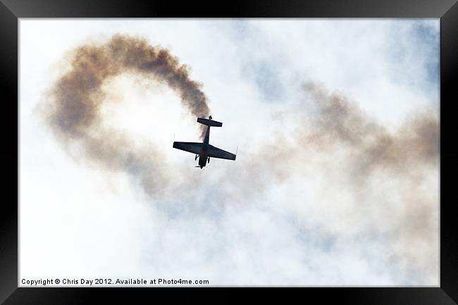 Extra 300 aerobatic plane and smoke trail Framed Print by Chris Day