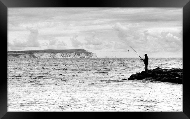 Lone Angler in black and white Framed Print by Chris Day