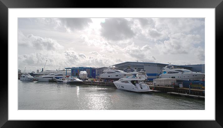 Sunseeker Boat Yard Framed Mounted Print by Chris Day