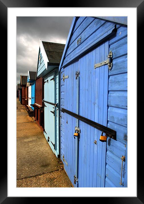 Highcliffe huts Framed Mounted Print by Chris Day