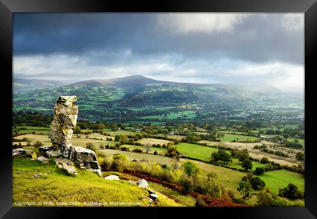 Sugar Loaf and Skirrid under a Stormy Sky. Framed Print by Philip Veale