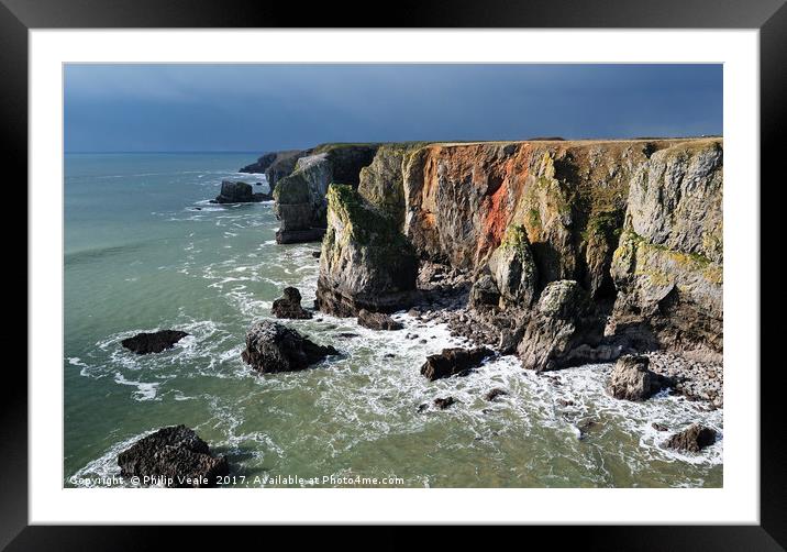 Stack Rocks Pembrokeshire as a storm approaches. Framed Mounted Print by Philip Veale