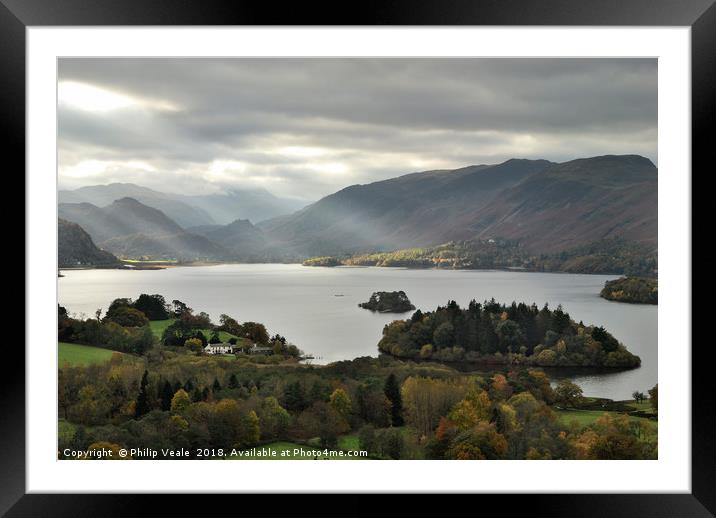 Derwent Water under a stormy autumn sky. Framed Mounted Print by Philip Veale