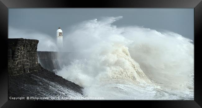 Porthcawl Lighthouse as Storm Freya crashes ashore Framed Print by Philip Veale