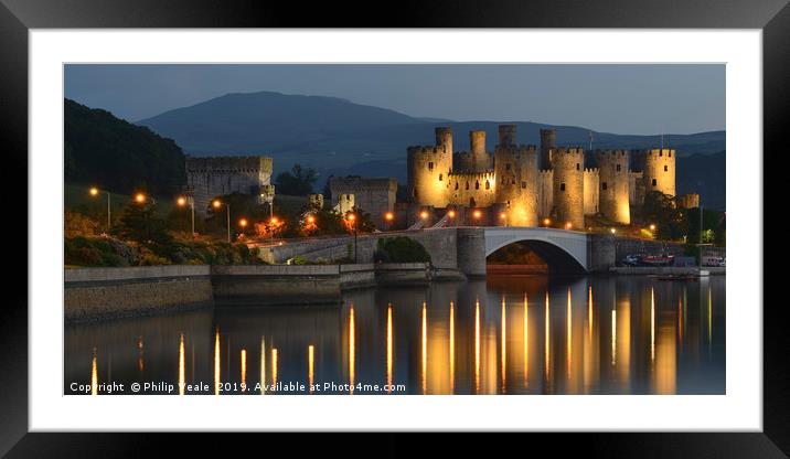 Conwy Castle's Dusk Illumination Framed Mounted Print by Philip Veale