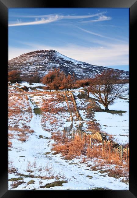 Sugar Loaf Abergavenny in Winter's Embrace. Framed Print by Philip Veale