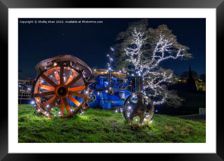 Tractor & Tree covered in Christmas fairy lights Framed Mounted Print by Shafiq Khan