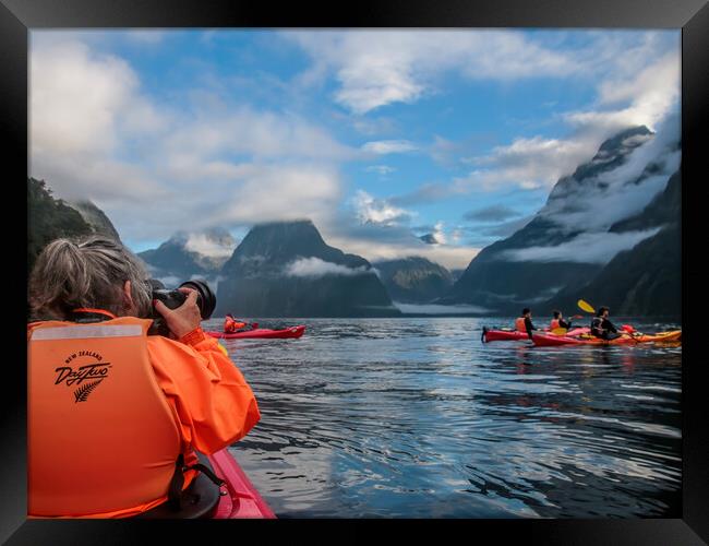Kayaking on Milford Sound between the Mountains in Framed Print by Chantal Cooper