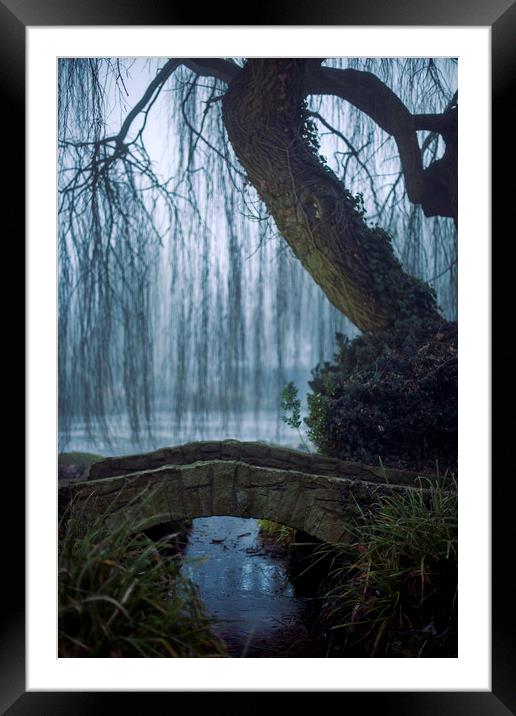 Bridge over frozen lake in Cedars Park Framed Mounted Print by Nick Sayce