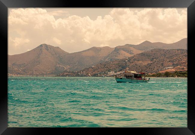 Boat in Spinalonga Framed Print by Nick Sayce