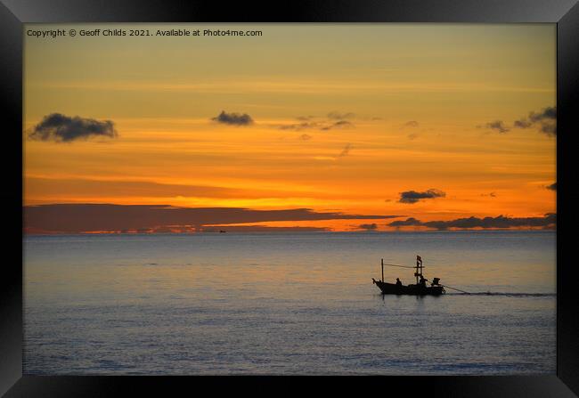 Tropical nautical sunrise seascape with fishing boat silhouette. Framed Print by Geoff Childs