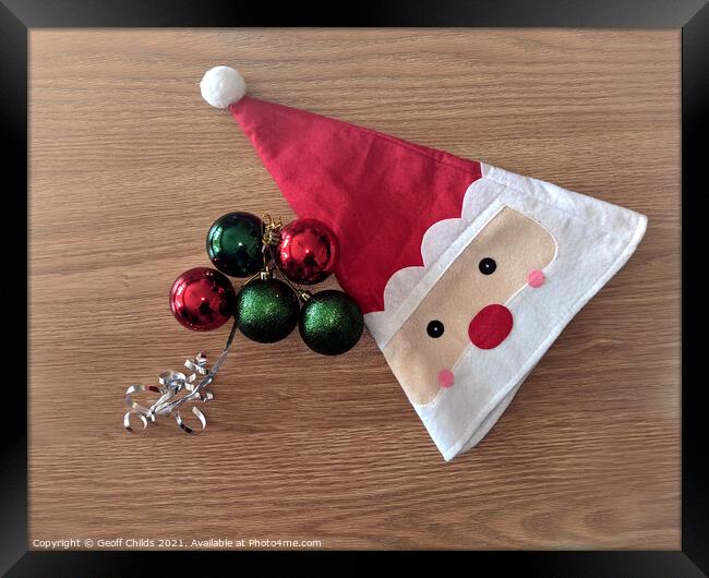  Christmas decorations Santa Hat - theme image. Framed Print by Geoff Childs