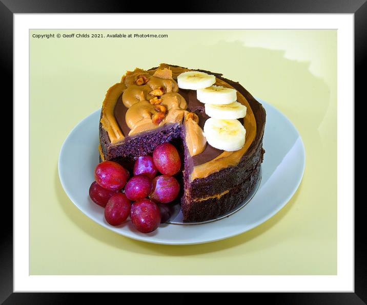 Chocolate Cake served with fruit on a plate. Photo is isolated o Framed Mounted Print by Geoff Childs