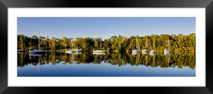 Lake landscape waterscape with boat reflections. Framed Mounted Print by Geoff Childs