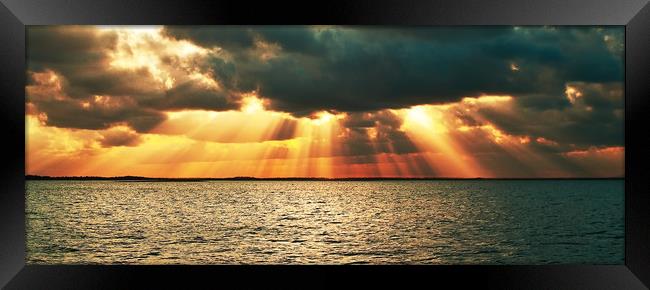 Magnificent golden sun rays. Framed Print by Geoff Childs