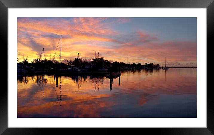 Sunrise silhouette Tin Can Bay. Framed Mounted Print by Geoff Childs