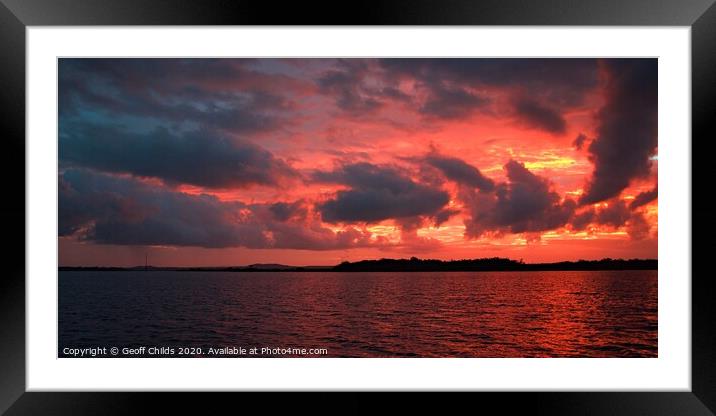 Stormy ocean sunset wth reflections. Framed Mounted Print by Geoff Childs