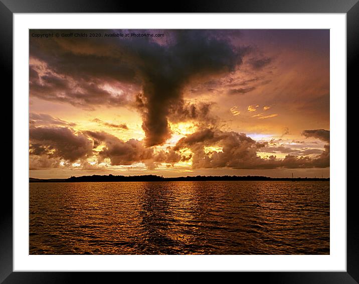 Turbulent golden cloudy seascape sunset. Framed Mounted Print by Geoff Childs