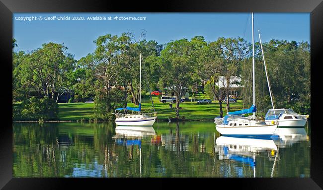 Yachts and green parkland, Lake Macquarie. Framed Print by Geoff Childs