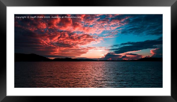 Crimson Sunrise Seascape with Water Reflections. Framed Mounted Print by Geoff Childs