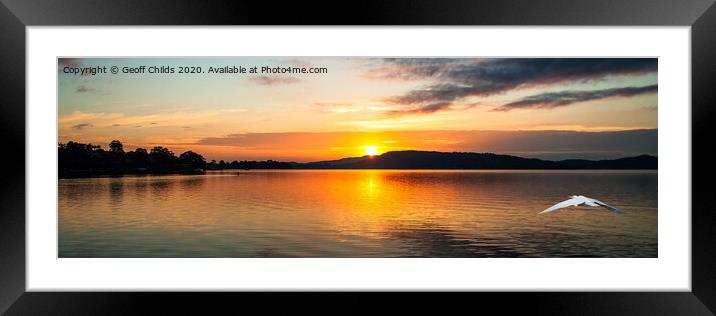 Orange sunrise waterscape reflections panorama. Framed Mounted Print by Geoff Childs