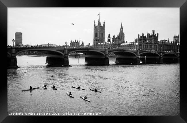 Kayaks by Thames river at Westminster Bridge Framed Print by Angela Bragato