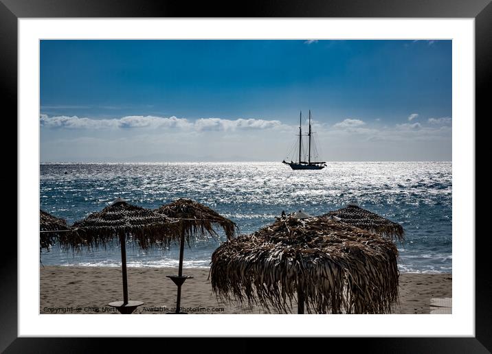 Yacht, at anchor off shore at Platis Gialos, Sifnos. Framed Mounted Print by Chris North