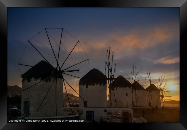 Sunset over the Windmills of Mykonos. Framed Print by Chris North
