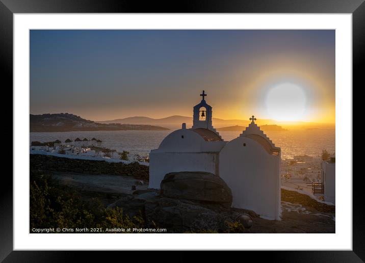 Sunset over the Aegean Sea in Mykonos, Greece. Framed Mounted Print by Chris North