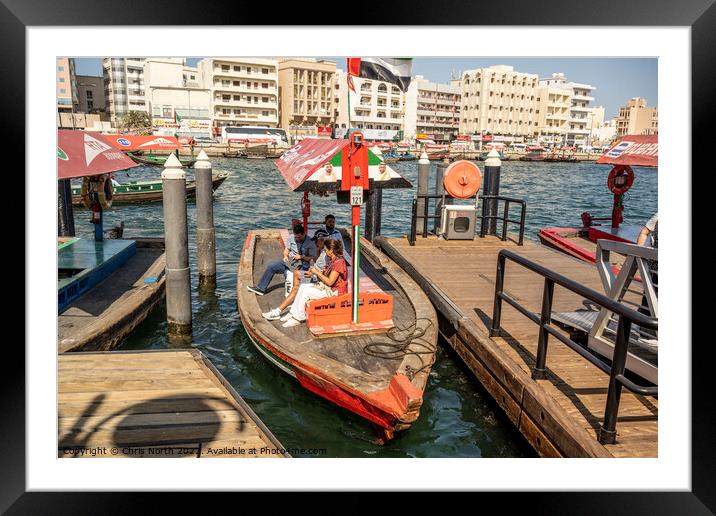 Water taxi on Dubai creek. Framed Mounted Print by Chris North