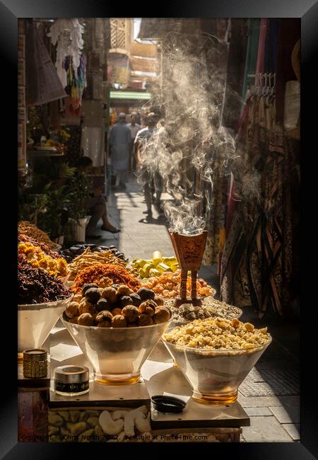 Aromatic herbs smouldering at the spice souk in Dubai. Framed Print by Chris North