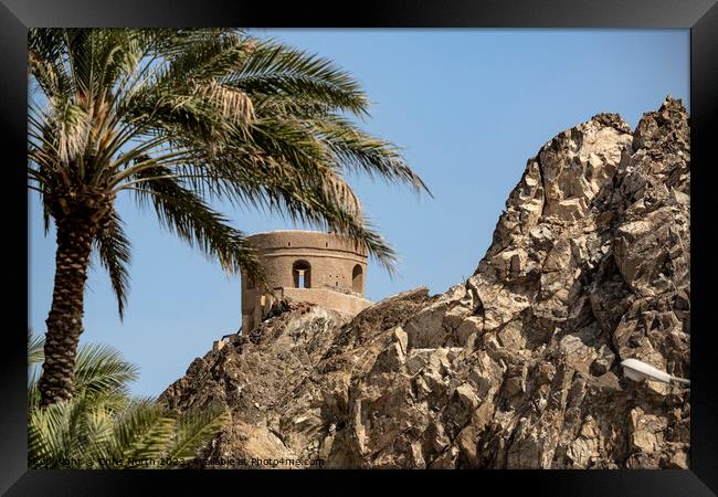 Fortification overlooking Muscat harbour, Oman. Framed Print by Chris North