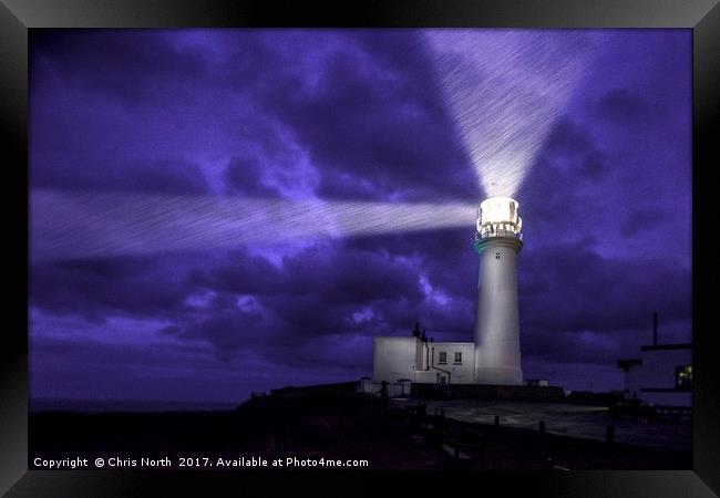 Flambrough Head Lighthouse, a dark and stormy nigh Framed Print by Chris North