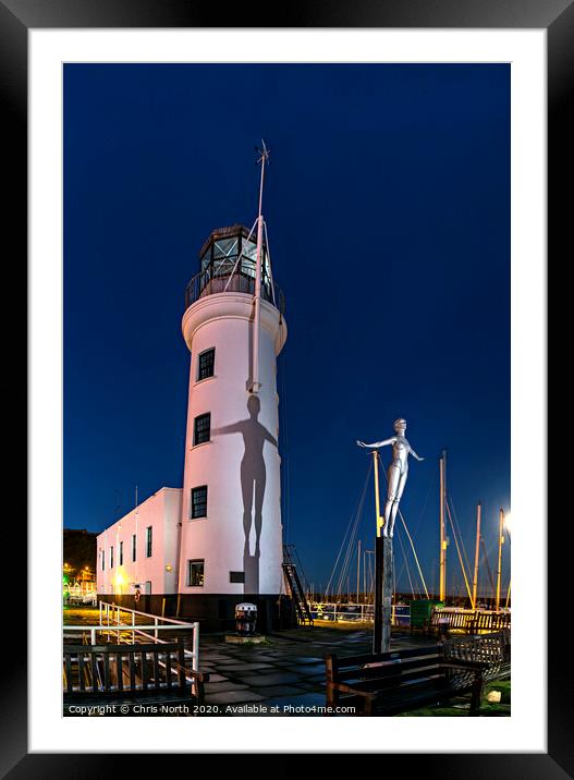 Scarborough Lighthouse at dusk. Framed Mounted Print by Chris North