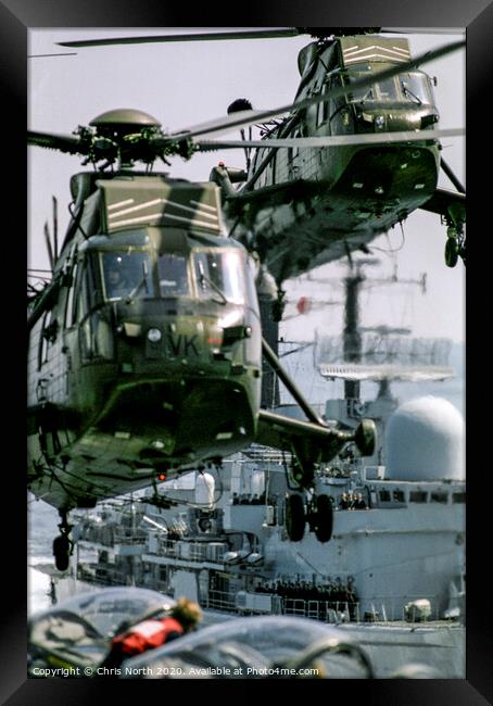 Seaking Mk4  helicopter in close formation Framed Print by Chris North