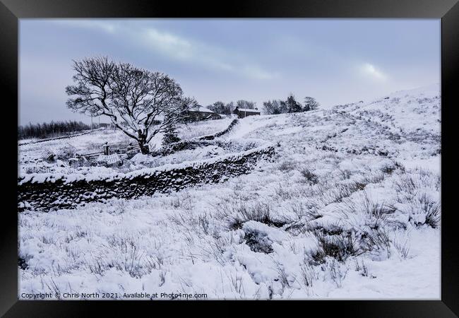 Farmhouse on Ilkley Moor in winter. Framed Print by Chris North